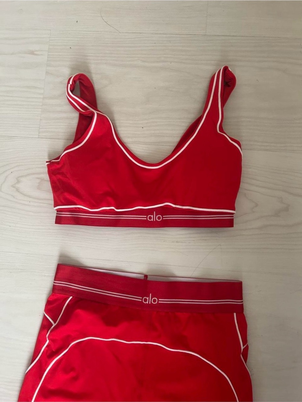 ALO Yoga Red Sports Bra and leggings set with White Piping